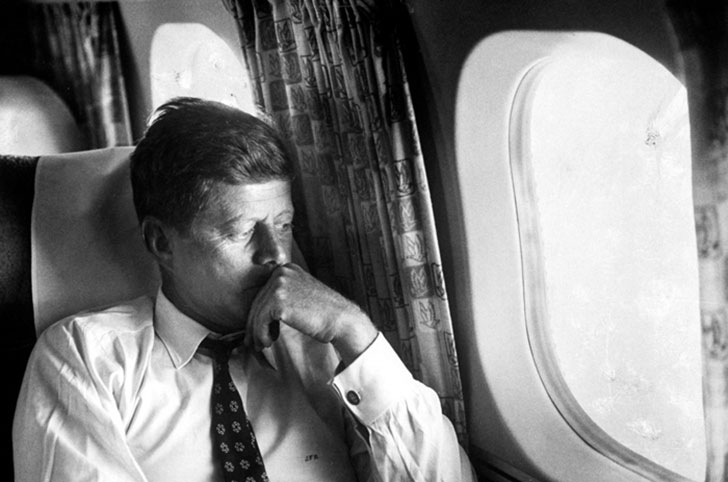 JFK on Air Force One deep in thought after a tough fought campaign against Richard M. Nixon – 1963