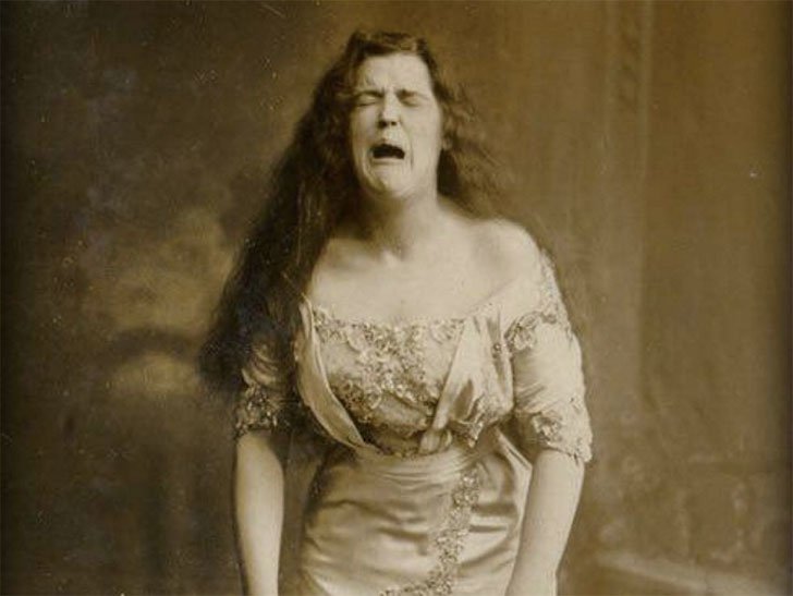The original perfectly timed photo - a woman sneezing
