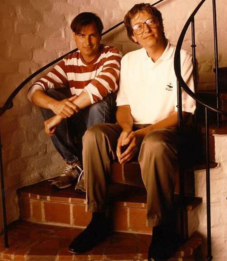 Steve Jobs and Bill Gates, two of the most powerful and influential men of the 20-21st century sit in a hallway – 1991